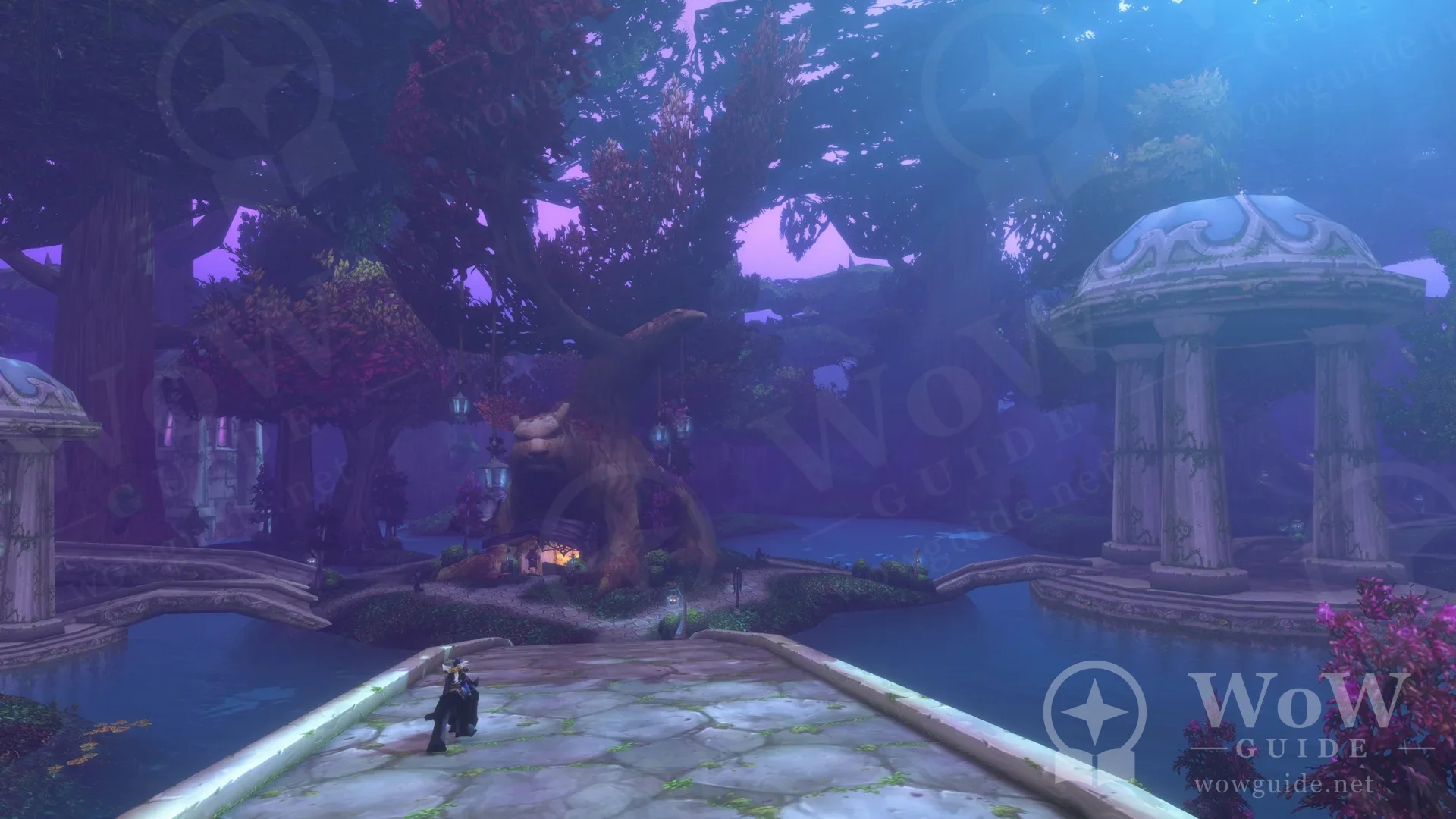 A domed structure among purple trees with a character standing on a stone bridge