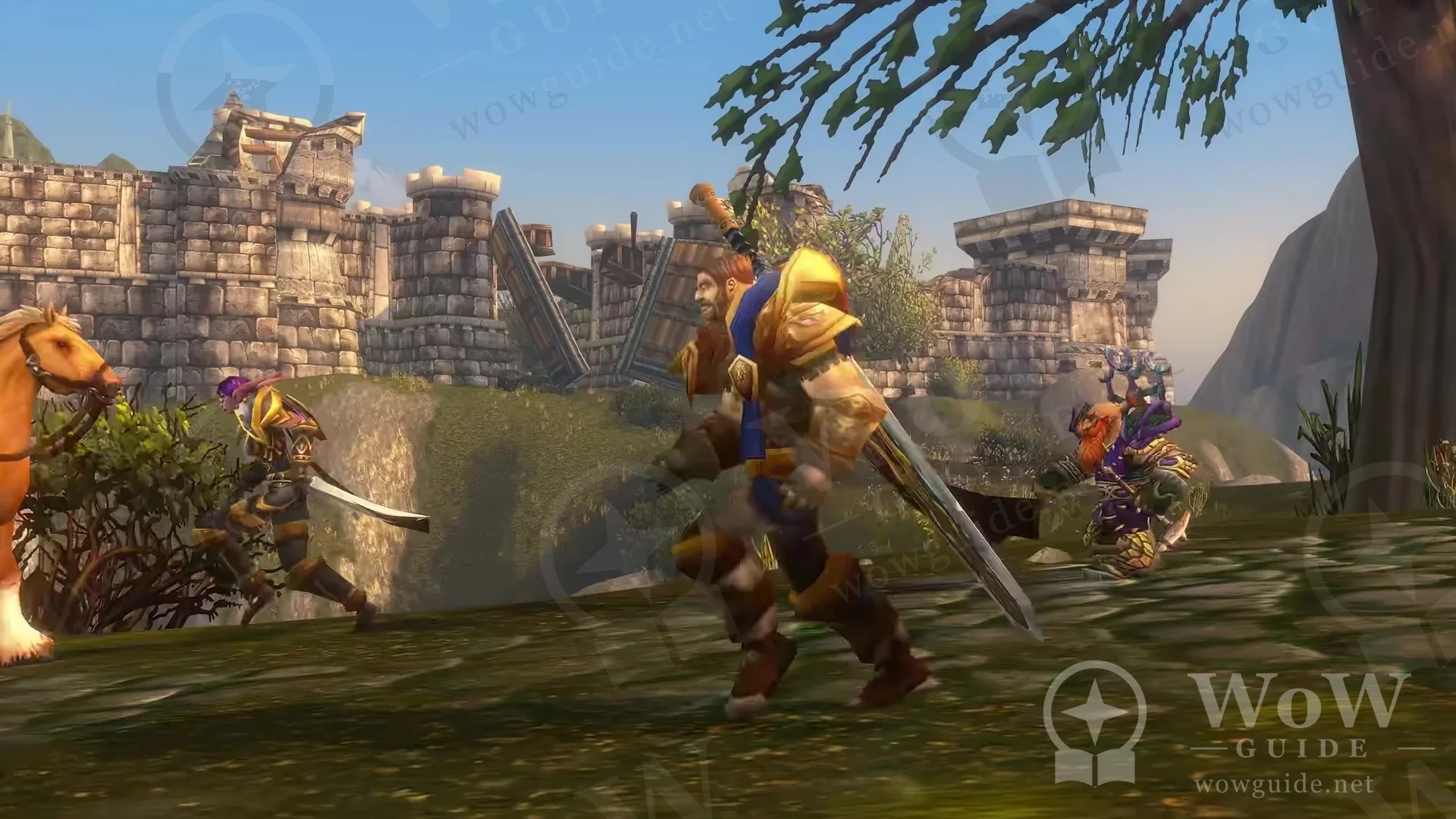 A gold-armoured character with a sword fighting in front of stone walls